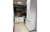 Zostava kuchyne Nitra-Softline/Laser-vystavený kus, biely lak/sivá taupe